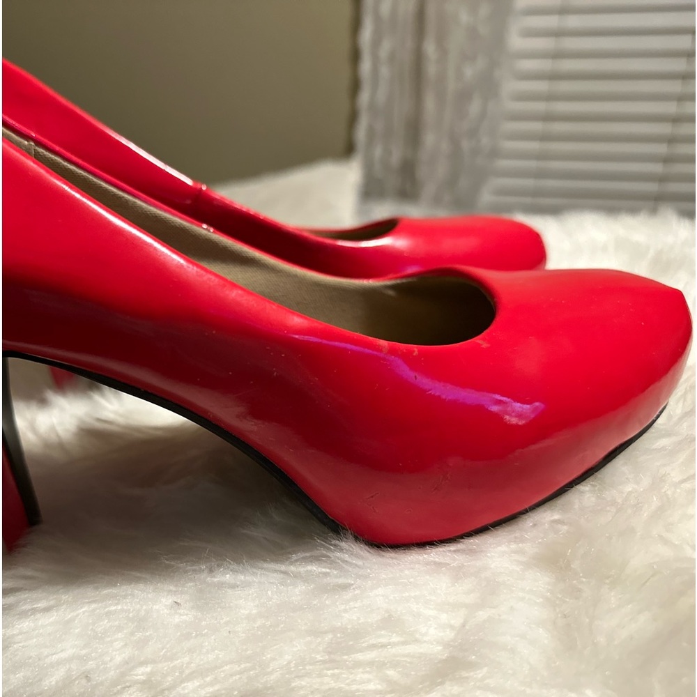 Red Pattened leather heels.